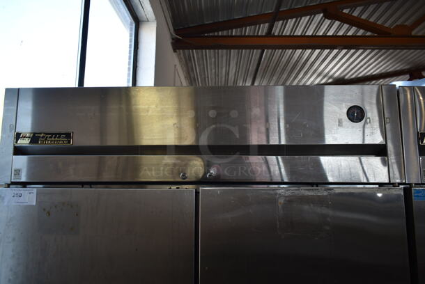 2013 True TG2R-2S ENERGY STAR Stainless Steel Commercial 2 Door Reach In Cooler w/ Poly Coated Racks on Commercial Casters. 115 Volts, 1 Phase. Tested and Working! - Image 2 of 8
