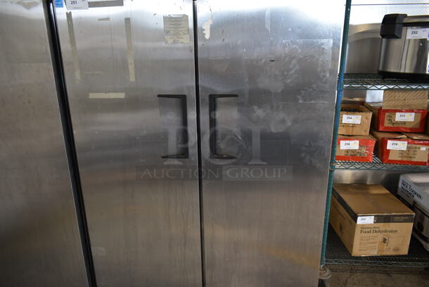 2014 True TG2R-2S ENERGY STAR Stainless Steel Commercial 2 Door Reach In Cooler w/ Poly Coated Racks on Commercial Casters. 115 Volts, 1 Phase. Tested and Working! - Image 3 of 8