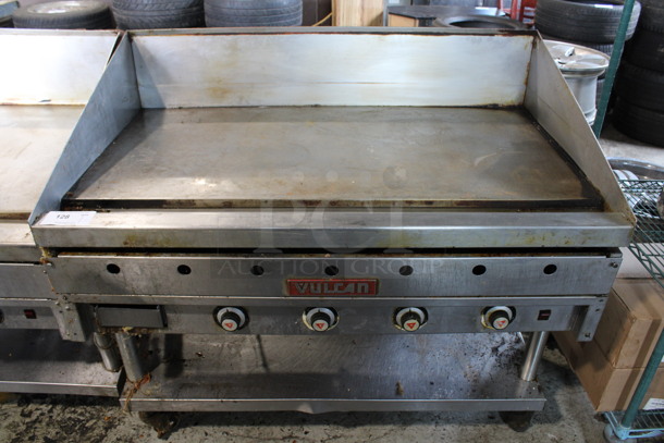 Vulcan Stainless Steel Commercial Natural Gas Powered Flat Top Griddle w/ Metal Under Shelf on Commercial Casters. 48x30x46