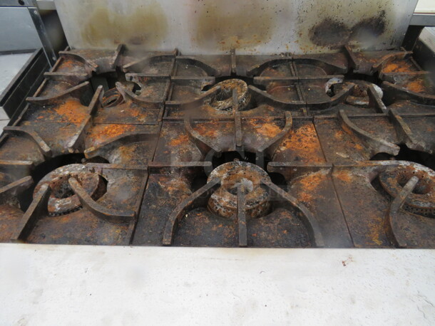 One Asber 6 Burner Natural Gas Range With Over Shelf, Missing 1 Knob. Unable To Test. 36X34X57 - Image 2 of 3