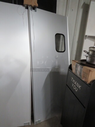 One NEW Stainless Steel Kitchen Traffic Door With Hardware. 35X82.5