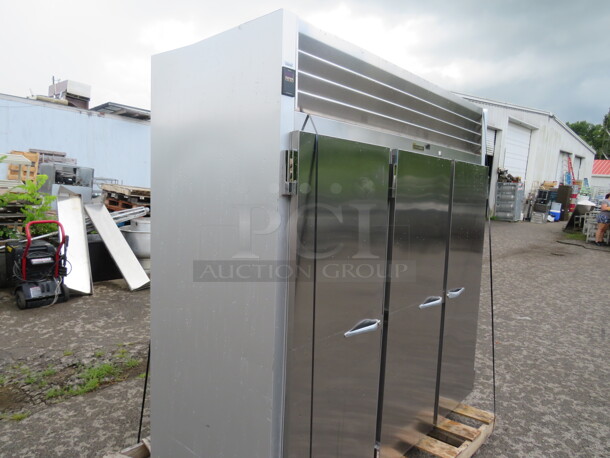 One WORKING 3 Door Stainless Steel Traulsen Refrigerator With 9 Racks, On Casters. 115 Volt. Model# G30011. 77X35X83.5. $9176.00. - Image 6 of 6