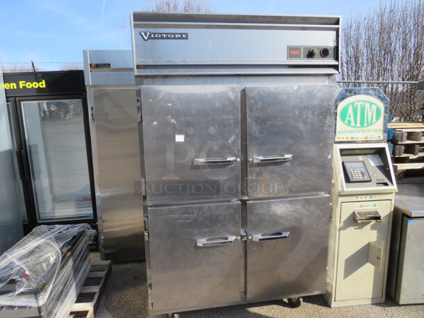One Stainless Steel Victory 2 Dutch Door Heated Holding Cabinet On Casters. 52X35X84. $12,377.70.