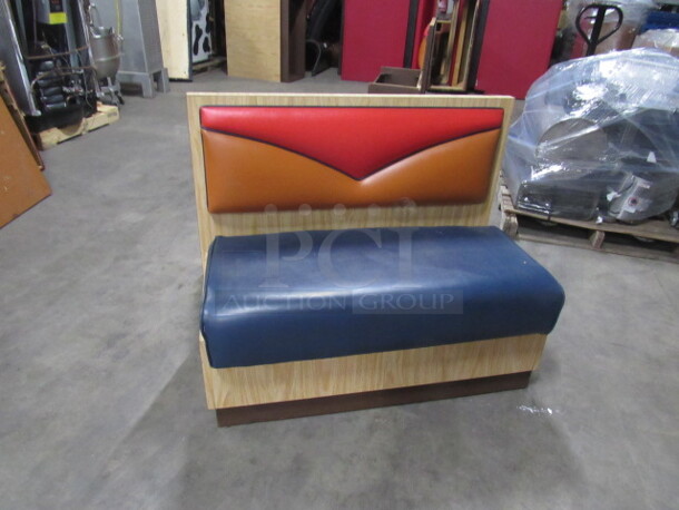 One Single Sided Laminate Booth With A Blue Cushioned Seat And Red/Brown Cushioned Back. 45X23X36
