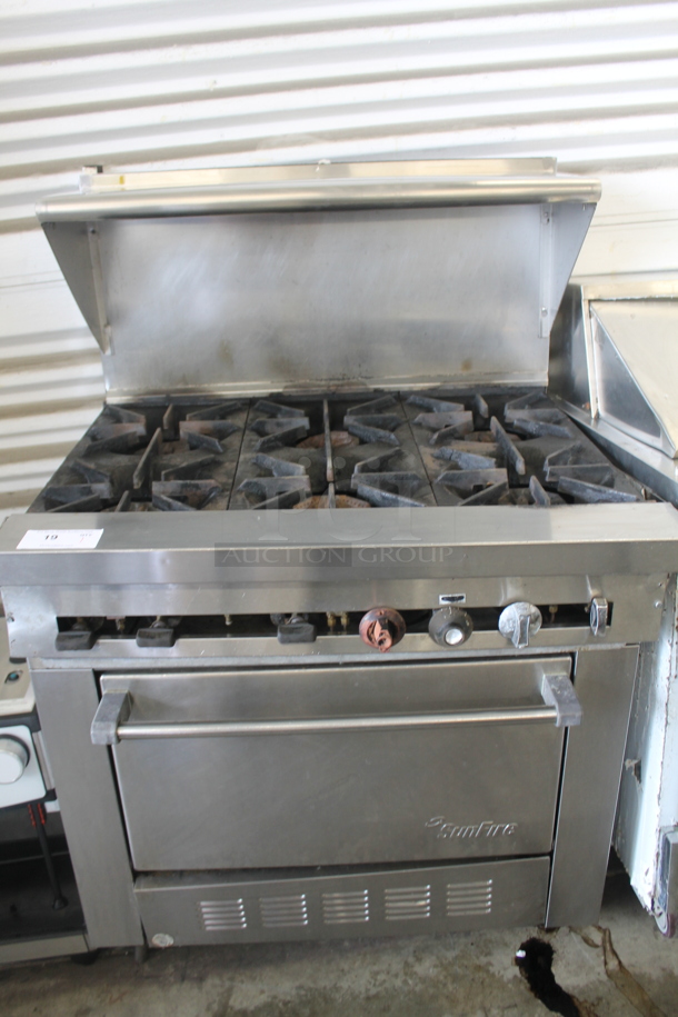 Garland SunFire SX-6-26 Stainless Steel Commercial Natural Gas Powered 6 Burner Range w/ Oven, Over Shelf and Back Splash.  - Image 1 of 9