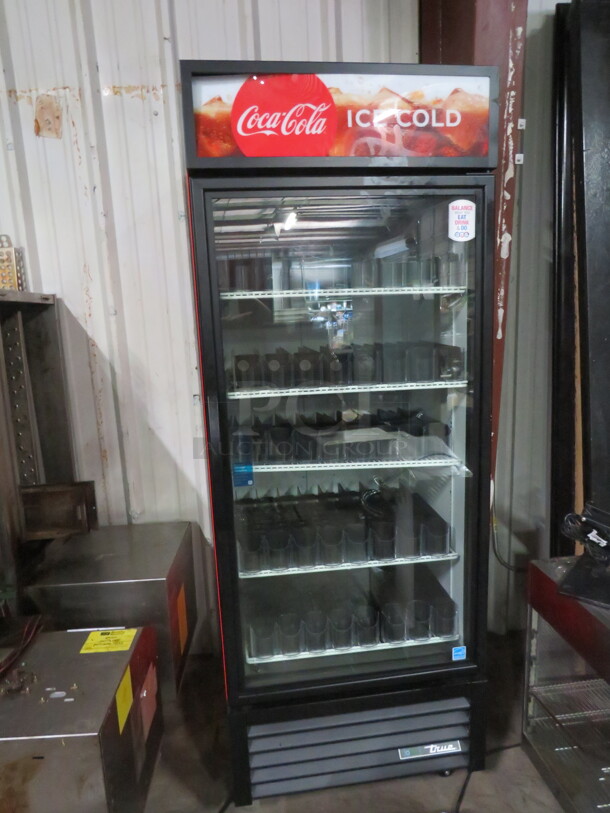 One True 1 Door Refrigerator Glass Door Merchandiser With 5 Racks, With Soda Racking On Casters. WORKING WHEN REMOVED.  Model# GDM-26-HC-TSLD1. 115 Volt. 30X32X81.5 - Image 1 of 4