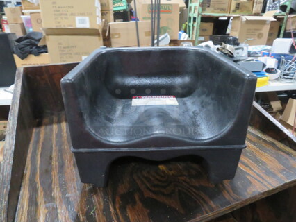 One Dual Sided Booster Seat.