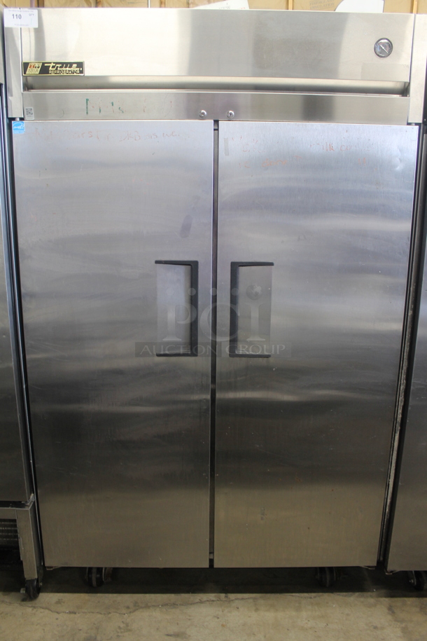 2013 True TG2R-2S ENERGY STAR Stainless Steel Commercial 2 Door Reach In Cooler w/ Poly Coated Racks on Commercial Casters. 115 Volts, 1 Phase. Tested and Working! - Image 1 of 6