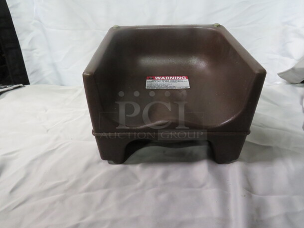One Cambro Dual Sided Booster Seat. #200BC.
