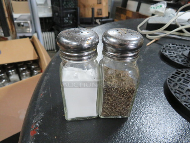 One Lot Of Salt/Pepper Shakers.