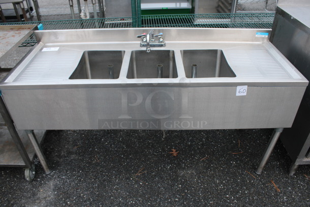 Stainless Steel Commercial 3 Bay Sink w/ Dual Drainboards, Faucet and Handles. 60x21.5x31. Bays 10x14x10. Drainboards 11x14x1 - Image 1 of 5