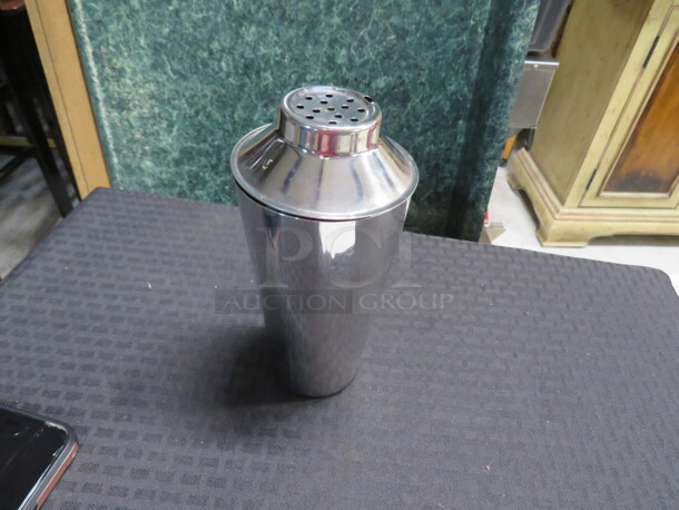 One Stainless Steel Mixing Glass With Shaker Lid.