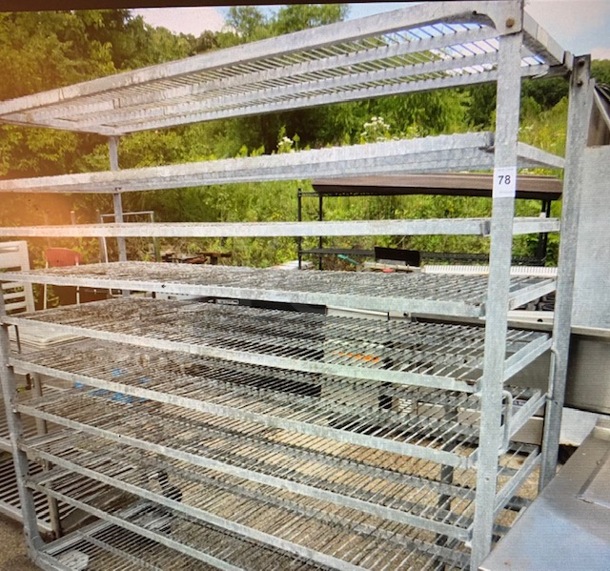 One Metal Shelving Unit With 10 Shelves On Casters. 70X24.5X71