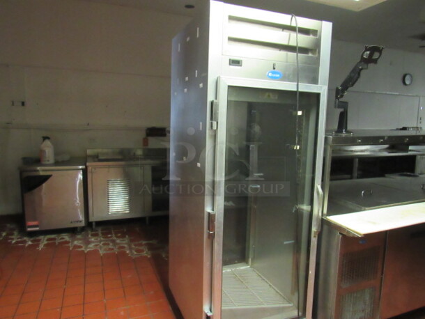 One Randell Pass Thru 1 Glass Door Refrigerator With 1 Rack On Casters. Model# 2010P. 115 Volt. 30X36X81