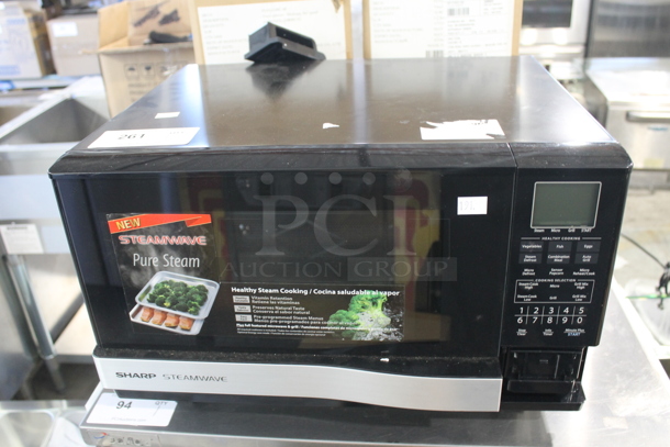 Sharp AX-1100S Metal Microwave Oven. 120 Volts, 1 Phase. 