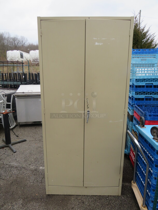 One 2 Door Metal Cabinet With 5 Shelves. Bottom Shelf Is Rusty. See Pics. 36X24X78                