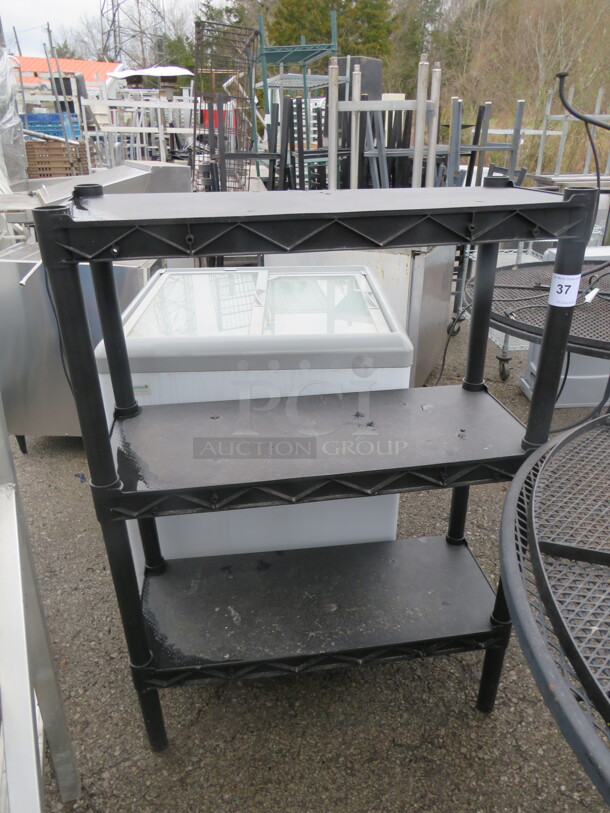 One Black Poly Shelving Unit With 3 Shelves. 32X13X46