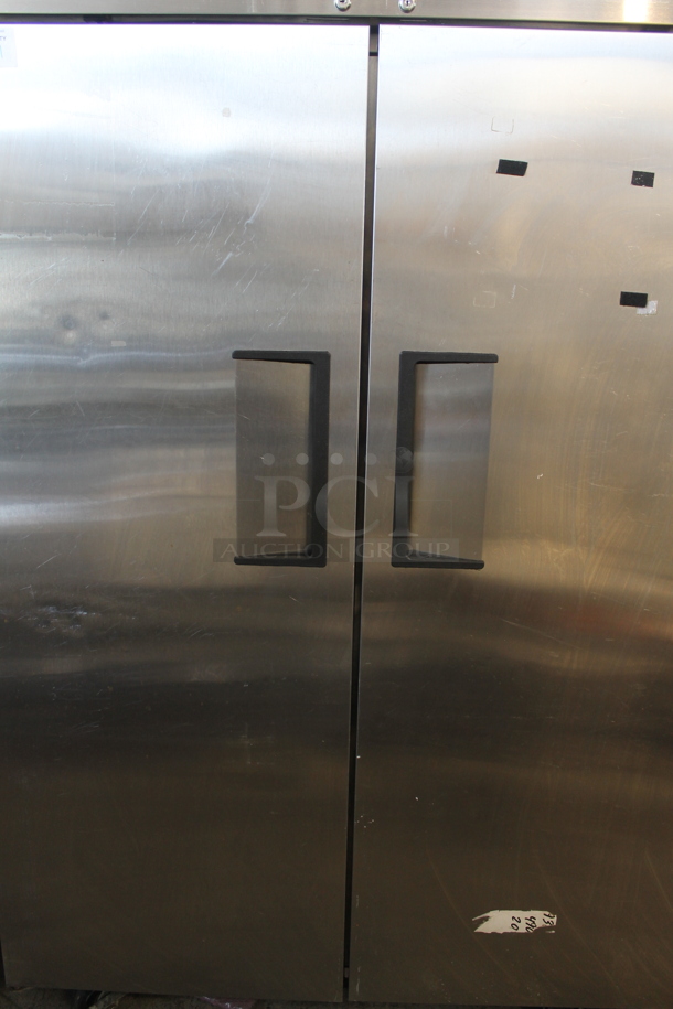 2012 True TG2R-2S ENERGY STAR Stainless Steel Commercial 2 Door Reach In Cooler w/ Poly Coated Racks on Commercial Casters. 115 Volts, 1 Phase. Tested and Working! - Image 4 of 7