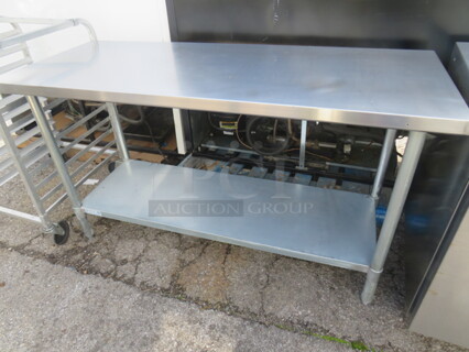 One Stainless Steel Table With Under Shelf. Model# TSW-2460E. 60X24X34