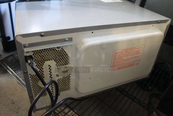 2011 Panasonic NE-1024F Stainless Steel Commercial Countertop Microwave Oven. 120 Volts, 1 Phase.  - Image 6 of 8