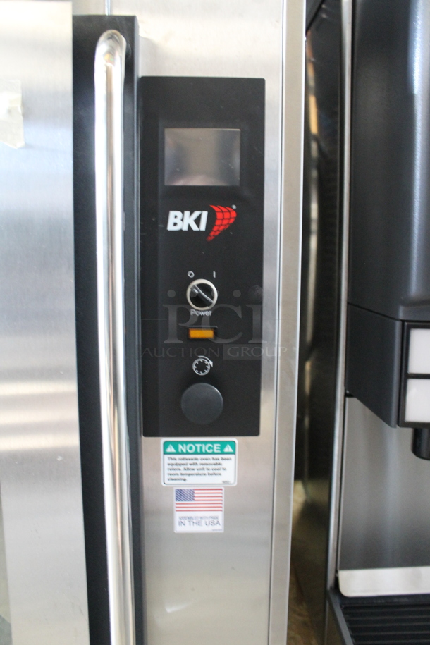 BRAND NEW! BKI VGG-16F Stainless Steel Commercial Electric Powered Rotisserie Oven on Commercial Casters. Stock Picture Used as Gallery Picture. 208 Volts, 3 Phase. Goes GREAT w/ Lot #4! - Image 6 of 11