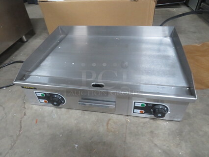 One NEW Vevor Electric Griddle. Model# LD-610. 110 Volt. User Manual, 2 Turners, And 2 Brushes. 26X19X8