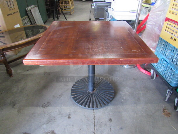 One Wooden Table Top On A decorative Metal Base. 36X36X30