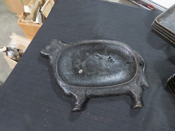 One Cast Iron Cow.