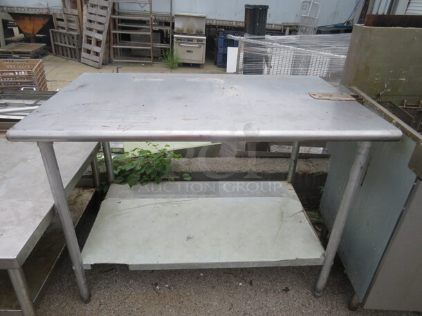 One Stainless Steel Table With Under Shelf And A 10lb Can Opener. 48X30X35 - Image 1 of 1