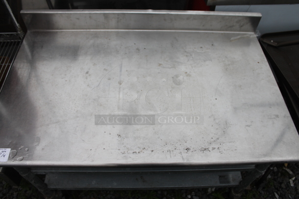 Eagle Stainless Steel Commercial Table w/ Back Splash and 2 Under Shelves on Commercial Casters. - Image 2 of 5