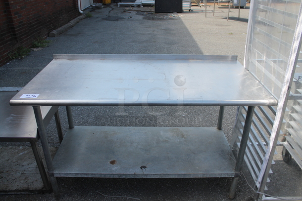 Stainless Steel Commercial Table w/ Under Shelf and Back Splash. - Image 1 of 2