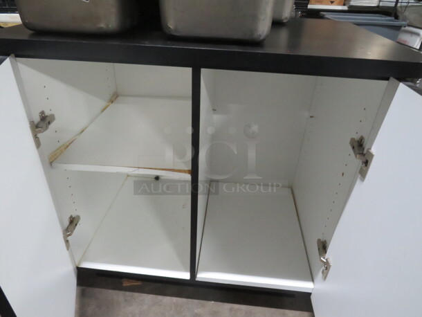 One 2 Door Black Laminate Cabinet With 1 Shelf. 36X24X34 - Image 2 of 2