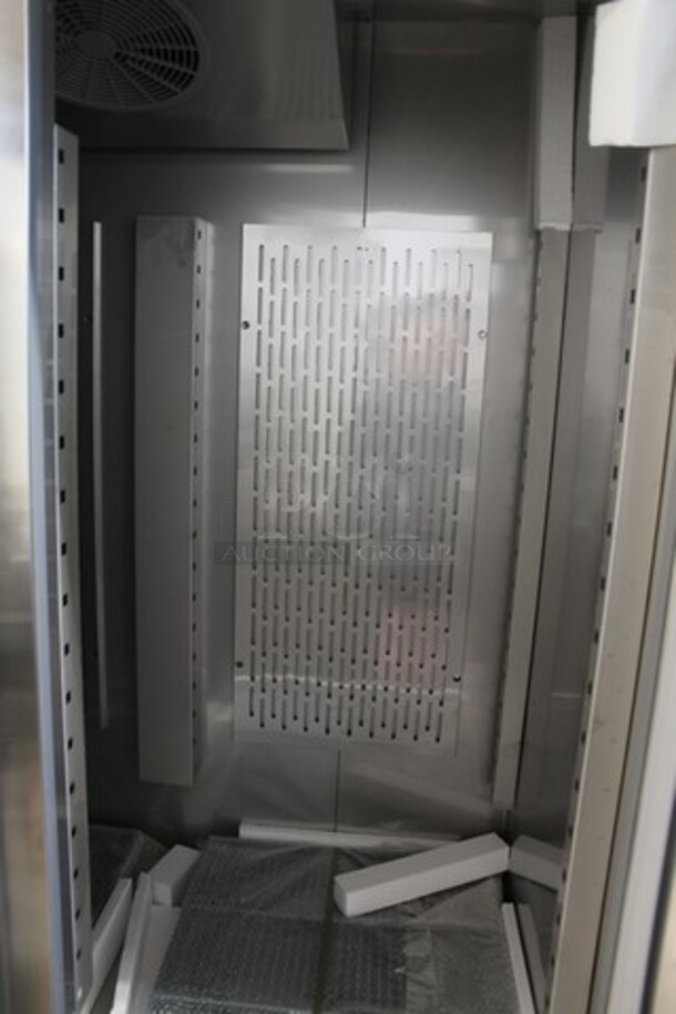 BRAND NEW SCRATCH AND DENT! 2023 Avantco 178SS3RHC Stainless Steel Commercial 3 Door Reach In Cooler Merchandiser w/ Poly Coated Racks on Commercial Casters. 115 Volts, 1 Phase. Tested and Working! - Image 4 of 7