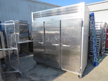 ONE AWESOME WORKING 3 Door Traulsen Refrigerator With 9 Racks On Casters. Model# G30011. 115 Volt. 76.5X34X83.5. $9175.68