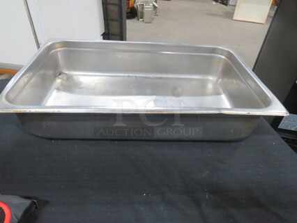 One Full Size 4 Inch Deep Hotel Pan.