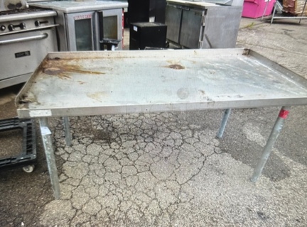 One Stainless Steel Equipment Table. 60X30X31