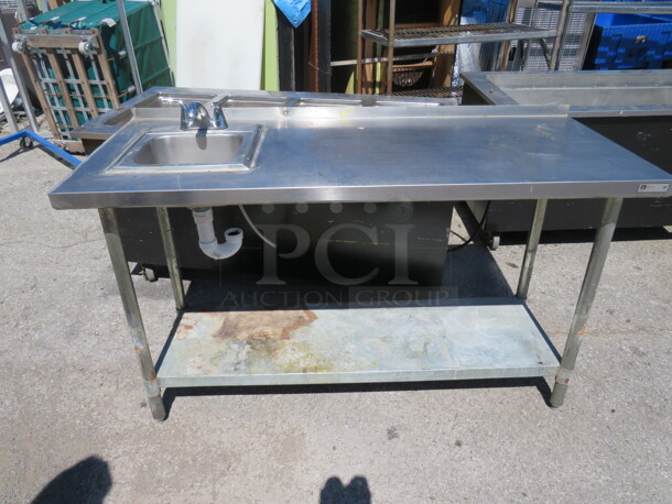 One Stainless Steel Table With Sink, Faucet, And Under Shelf. 60X24X35.5