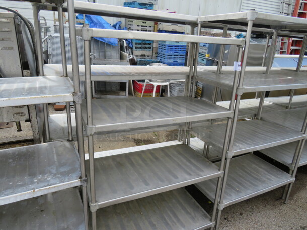 One Metal Shelving System With 4 Shelves. 36X20X57