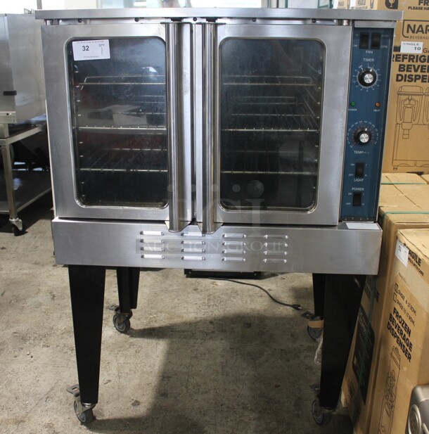 Stainless Steel Commercial Natural Gas Powered Full Size Convection Oven w/ View Through Doors, Metal Oven Racks, Thermostatic Controls and Metal Legs on Commercial Casters. - Image 1 of 8