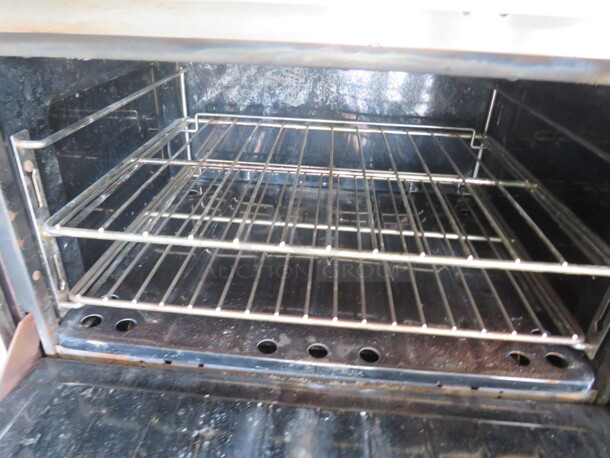 One Garland 6 Burner/24 Inch Griddle Natural Gas Range With 4 Racks, Over Shelf And Salamander. Model# H283. 60X33X59 - Image 3 of 6
