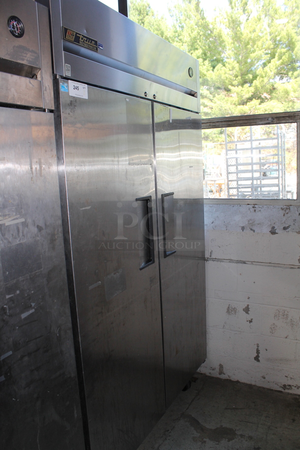 2012 True TG2R-2S ENERGY STAR Stainless Steel Commercial 2 Door Reach In Cooler w/ Poly Coated Racks on Commercial Casters. 115 Volts, 1 Phase. Tested and Working! - Image 1 of 5