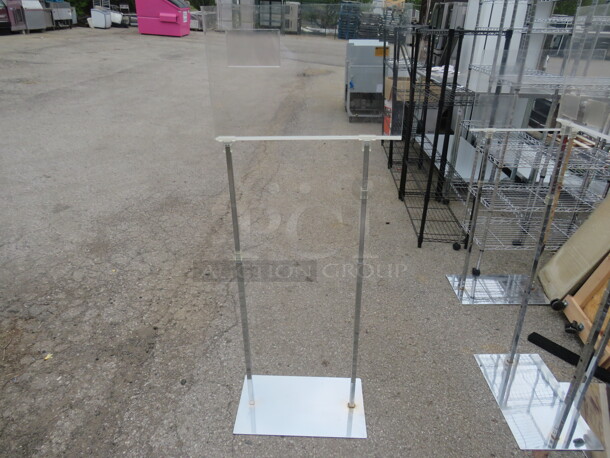 One Metal/Plexiglass Sign Holder. 22X12X57.5