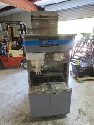One Carprgiani Floor Standing Shake And Sundae Heat Treatment Combo Freezer On Casters. Model# K3/E. Serial # J2Q-138. 208-230 Volt. 3 Phase. 32X40.5X69