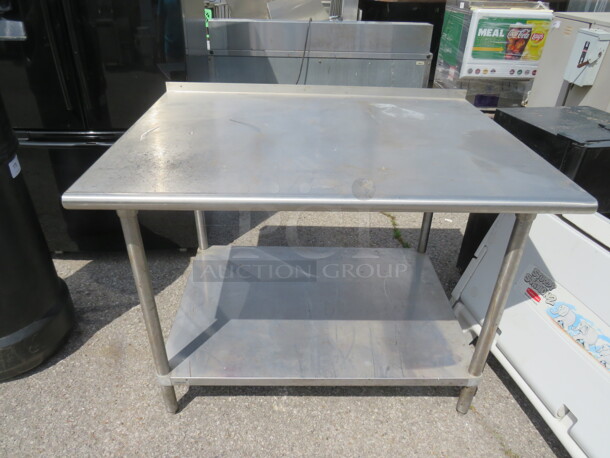 One Stainless Steel Table With Stainless Steel Under Shelf. 48X36X37