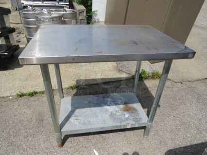 One Stainless Steel Table With Under Shelf. 36X24X33