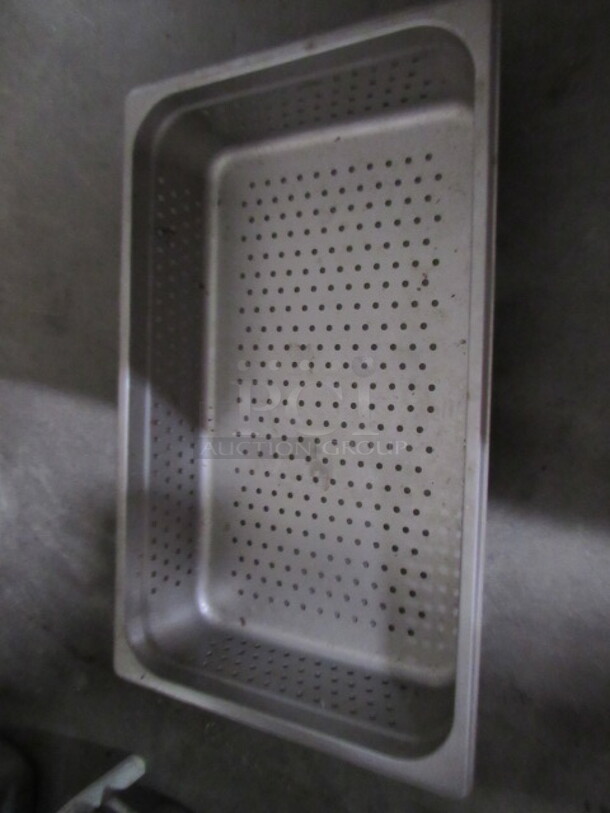 One Full Size 4 Inch Deep Perforated Hotel Pan. 