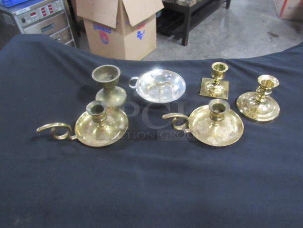 One Lot Of 6 Brass Candle Holders.