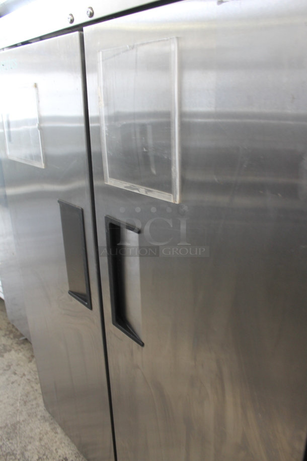 2013 True TG2R-2S ENERGY STAR Stainless Steel Commercial 2 Door Reach In Cooler w/ Poly Coated Racks on Commercial Casters. Tested and Working! - Image 4 of 7