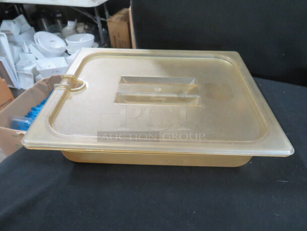 One 1/2 Size 2.5 Inch Amber Food Storage Container With Lid.