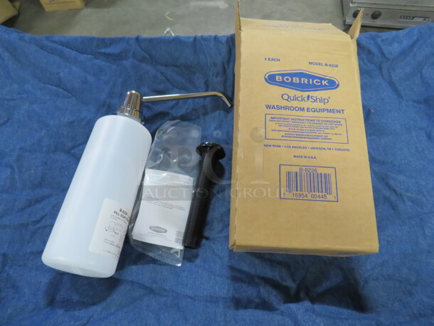 One NEW Bobrick Manual Soap Dispenser. # B-8226. $88.80.